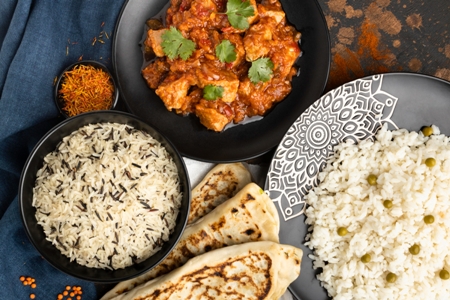 The lunch with jira and green peas rice with roti and panir