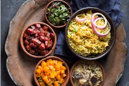 complete food dish with bhaji,sweet and rice
