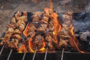 A non-veg cooking on grill.
